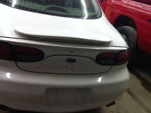 1999 - FORD TAURUS - used - Tail Light - Sdn, quarter panel mounted, solid red lens, RH