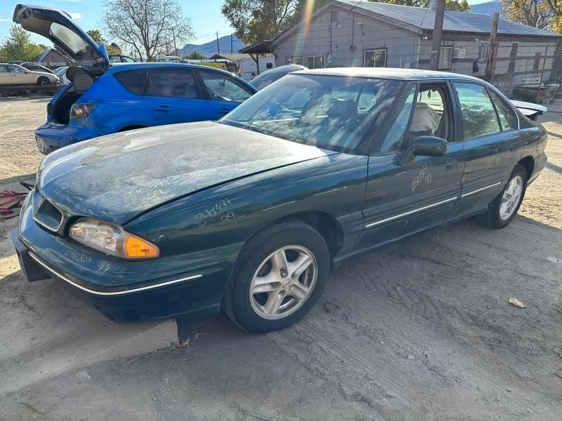 1998 Pontiac Bonneville Used Door Rear chrome moulding Left