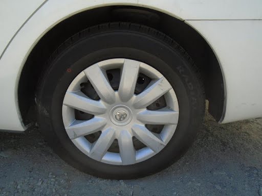 2006 - TOYOTA CAMRY - Used - Hub Cap/Wheel Cover - 15", (9 spoke)