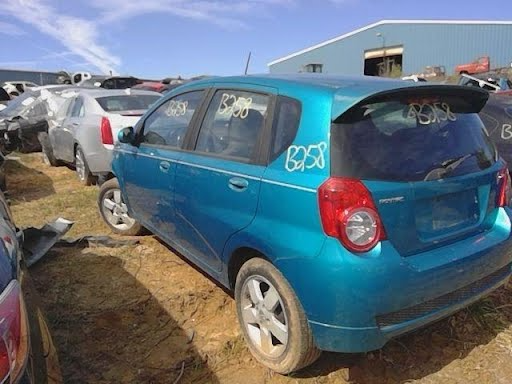2004-CHEVY AVEO-Fuel Filler Door-Rear; 4dr; LS & base model; Htbk; HATCHBACK