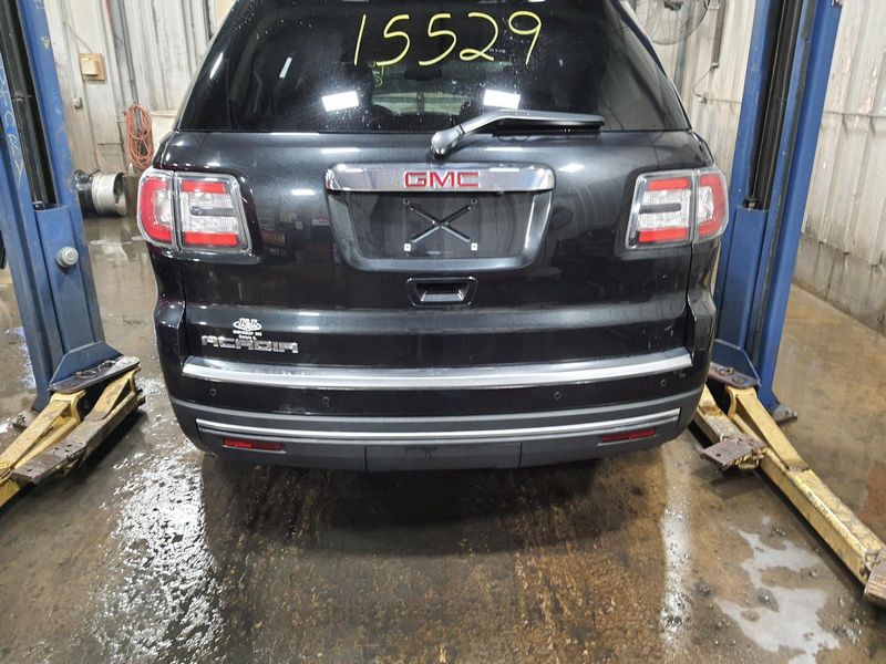 2016 GMC Acadia  Bumper Assy (Rear) includes cover SLT, (rear park assist, opt UD7), blind spot alert (opt UFT)