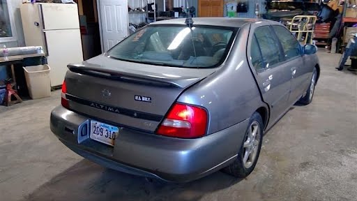 2001 - NISSAN ALTIMA - used - Bumper Assy (Rear) includes cover