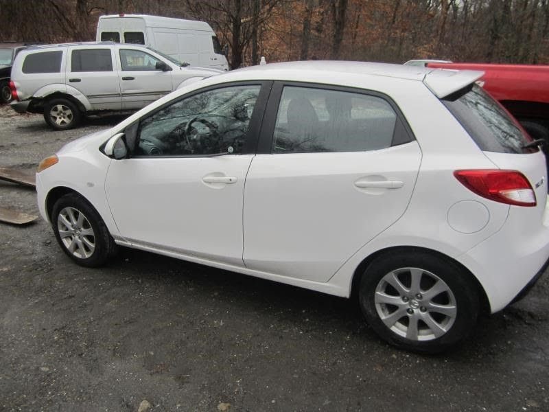 2011 - MAZDA 2 - Used - Wheel -  15x6, alloy (8 spoke)