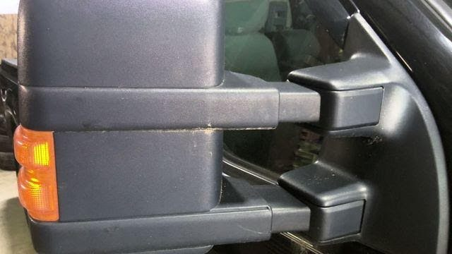 2011 FORD TRUCK-F250 SUPER DUTY Used Mirror Door Power, (dual arms heated, lamps), black textured entire head, power telescopic, w/o memory; RH Color - Black