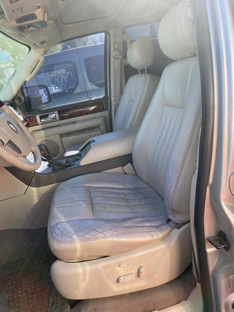 2004 Lincoln - Navigator Used Seat Front (bucket, adjustable headrest), (leather, lumbar), (without air bag), heat, LH, (memory)