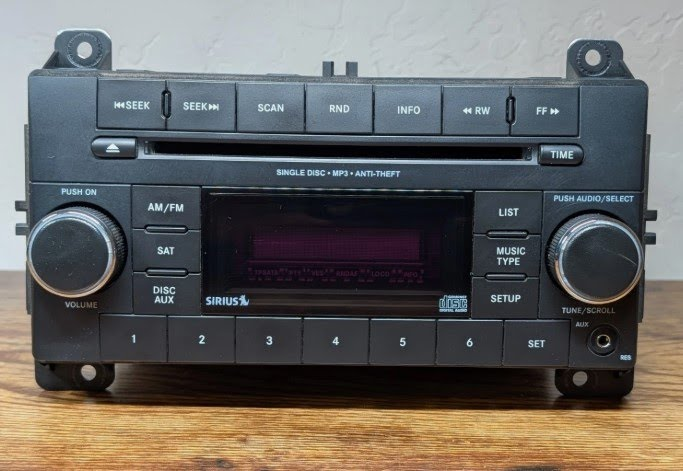 2013 DODGE DURANGO Used CD Player/Radioreceiver, face plate ID RES, w/o Uconnect P/N - P05091162AC