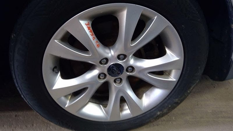 2011 Ford Taurus  Used Wheel 18x7-1/2 (aluminum, TPMS), (10 spoke, painted silver)