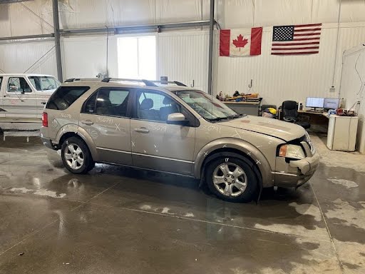 2006-FORD FREESTYLE-Seat Belt Rear-LH,3RD ROW REAR RETRACTOR,4DR,TAN